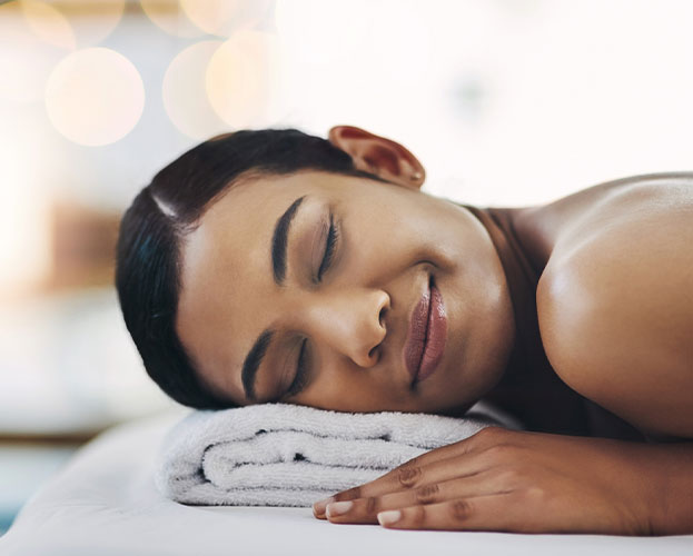 a woman lying on a bed