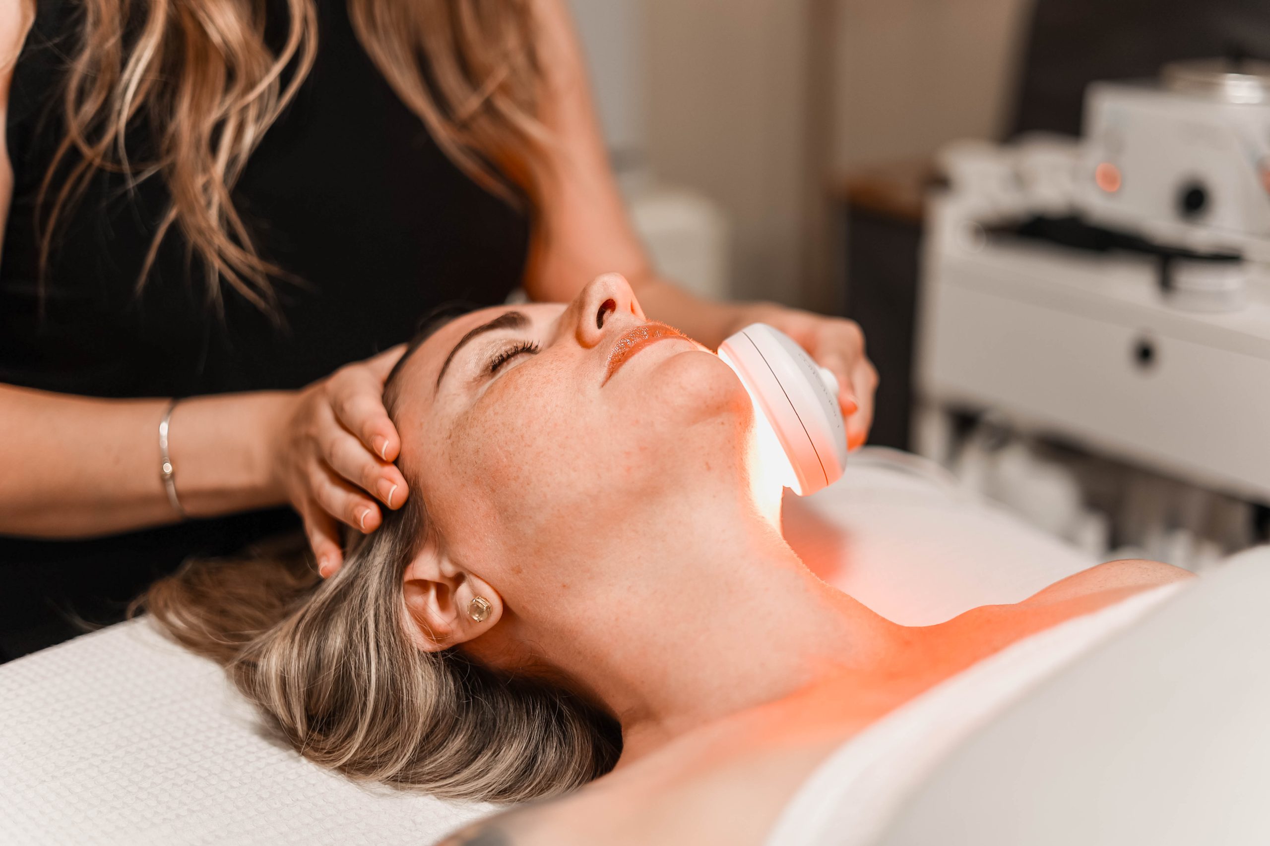 a woman sitting on a table